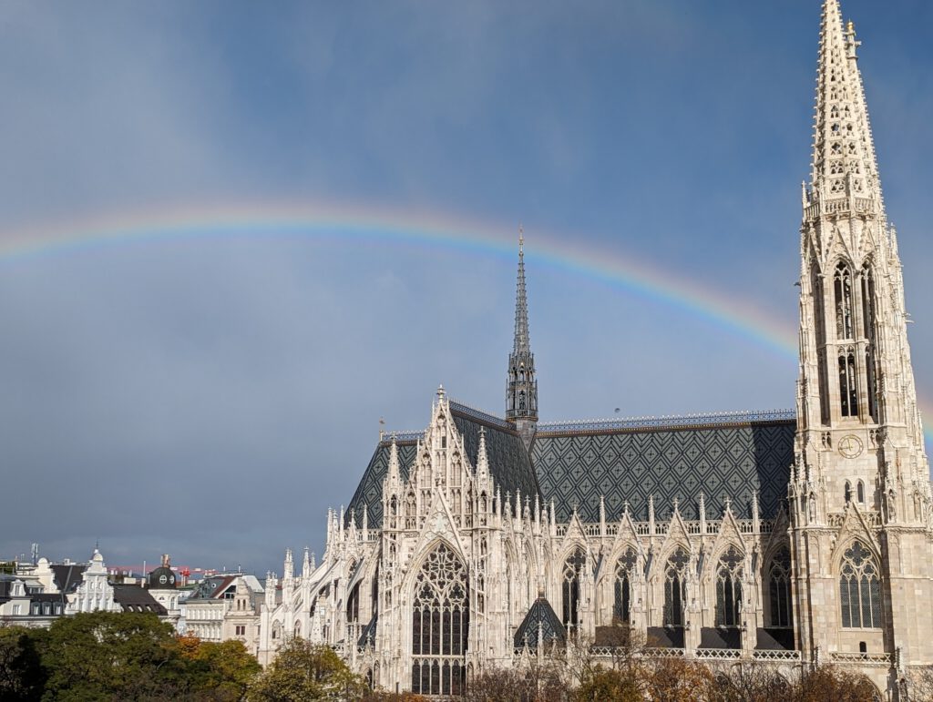 Snapshot a TNPM participant took of a rainbow in a blue sky over the Votivkirche, a neo-Gothic church in Vienna. 